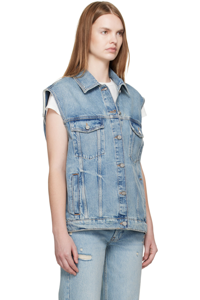 Non-stretch denim vest.

· Fading, whiskering, and subtle distressing throughout 
· Spread collar 
· Button closure
· Flap pockets at chest 
· Welt pockets at waist
· Adjustable button tabs at back hem 
· Logo-engraved silver-tone hardware
· Contrast stitching in tan 

Supplier color: Summer indigo