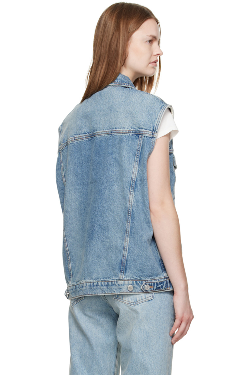 Non-stretch denim vest.

· Fading, whiskering, and subtle distressing throughout 
· Spread collar 
· Button closure
· Flap pockets at chest 
· Welt pockets at waist
· Adjustable button tabs at back hem 
· Logo-engraved silver-tone hardware
· Contrast stitching in tan 

Supplier color: Summer indigo