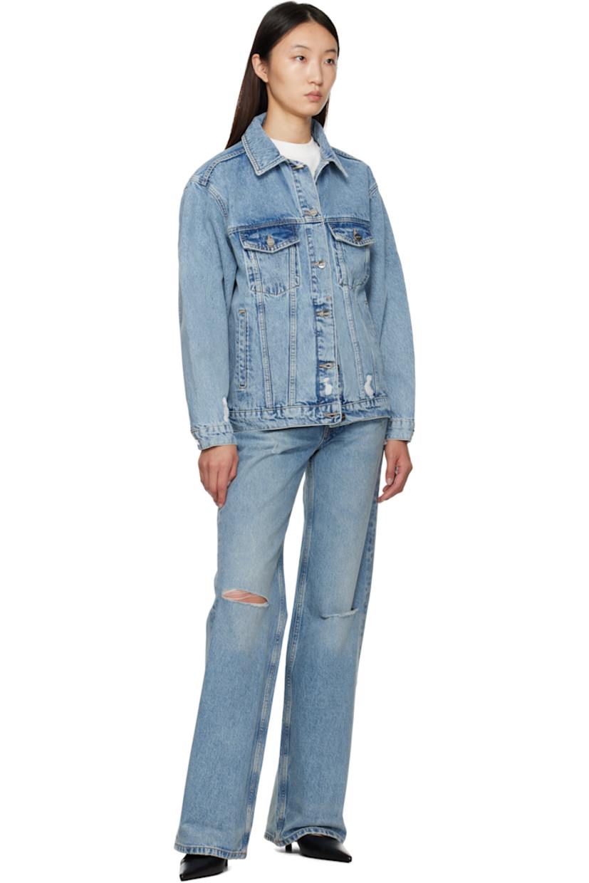 Wide-leg non-stretch denim jeans.

· Fading, whiskering, and distressing throughout
· Mid-rise
· Belt loops
· Five-pocket styling
· Button fly
· Logo patch at back waistband
· Logo engraved silver-tone hardware

Supplier color: Summer Indigo Destructed