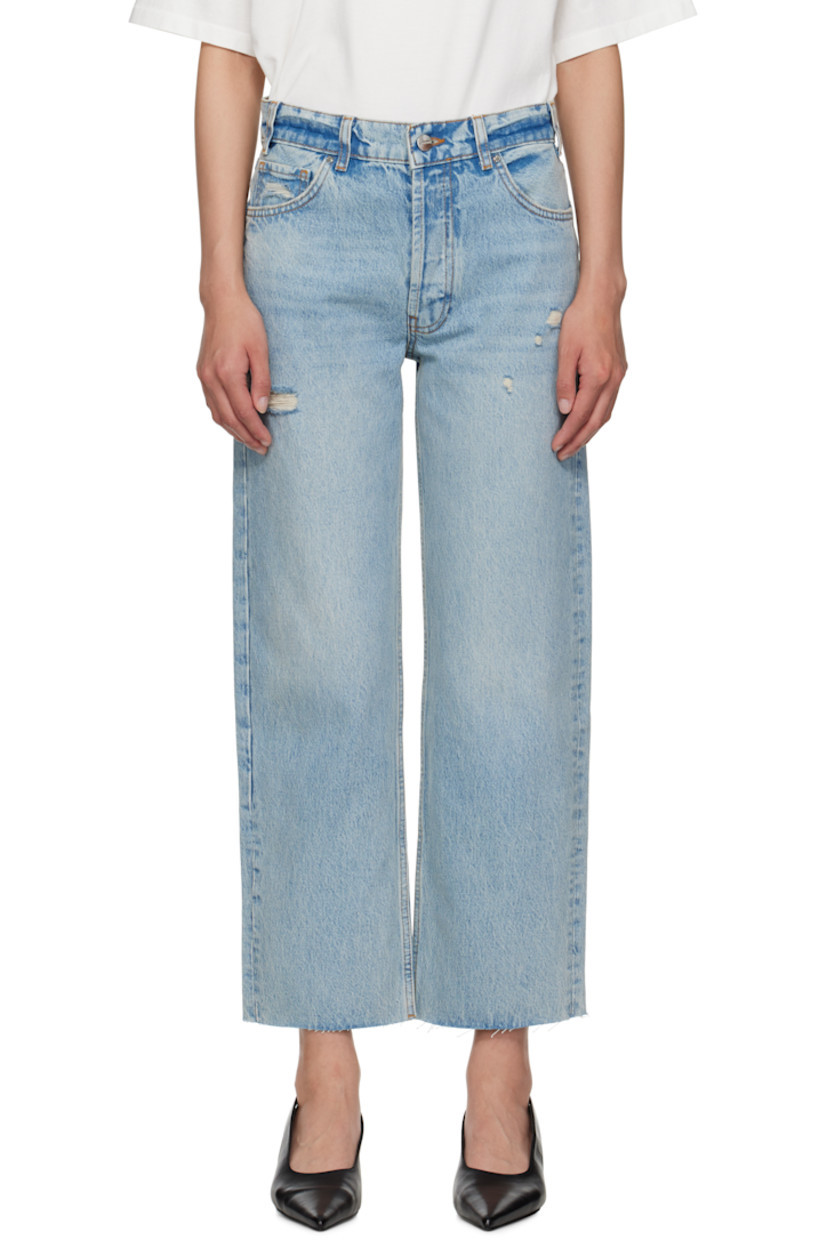 Heavyweight non-stretch denim jeans.

· Fading and distressing throughout
· Loose-fit, straight-leg
· Mid-rise
· Belt loops
· Five-pocket styling
· Button fly
· Raw edge at cropped cuffs
· Leather logo patch at back waistband
· Contrast stitching in tan

Supplier color: Blue Reservoir