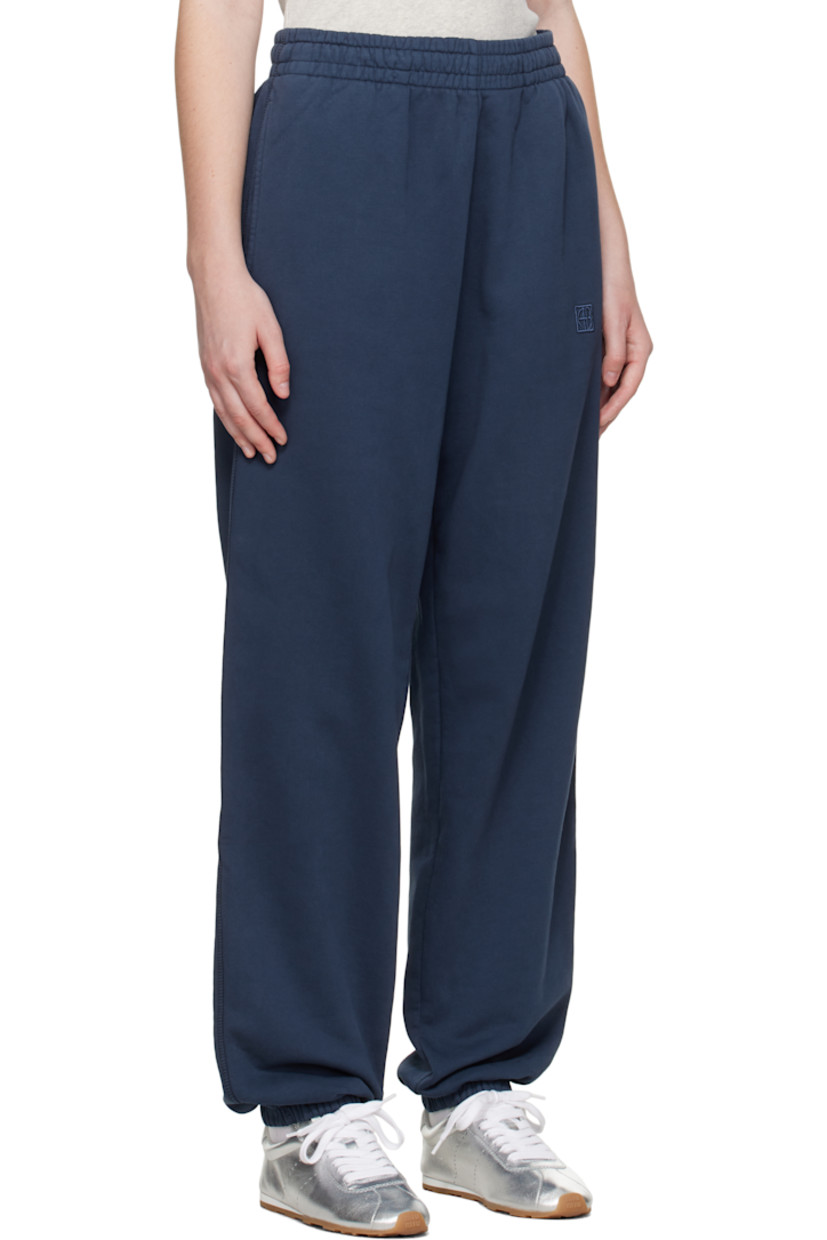 French terry lounge pants. 

· Concealed drawstring at elasticized waistband
· Two-pocket styling
· Logo embroidered at front leg
· Elasticized cuffs 

Supplier color: Washed navy