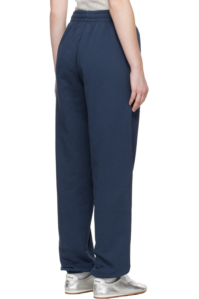 French terry lounge pants. 

· Concealed drawstring at elasticized waistband
· Two-pocket styling
· Logo embroidered at front leg
· Elasticized cuffs 

Supplier color: Washed navy