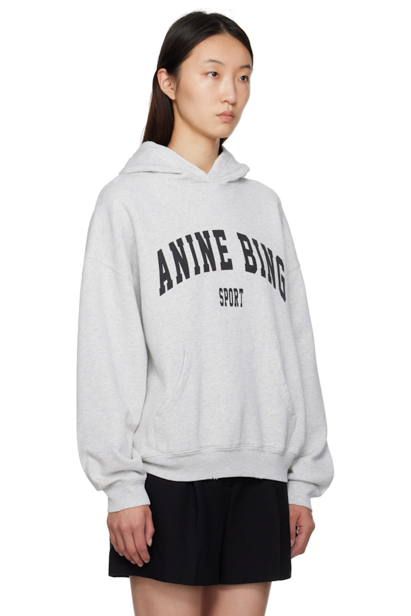 Relaxed-fit cotton fleece hoodie.

· Logo printed at front
· Kangaroo pocket
· Rib-knit hem and cuffs
· Distressing at hem

Supplier color: Heather Grey