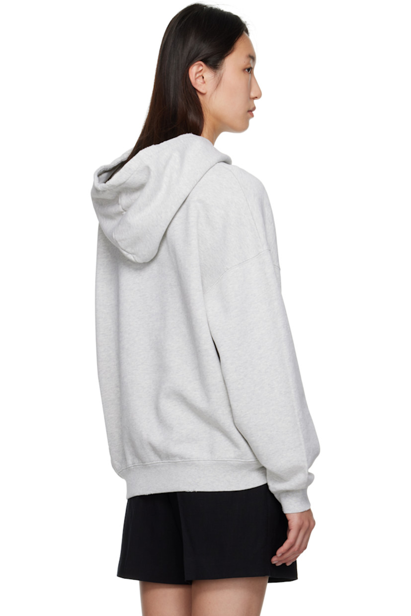 Relaxed-fit cotton fleece hoodie.

· Logo printed at front
· Kangaroo pocket
· Rib-knit hem and cuffs
· Distressing at hem

Supplier color: Heather Grey
