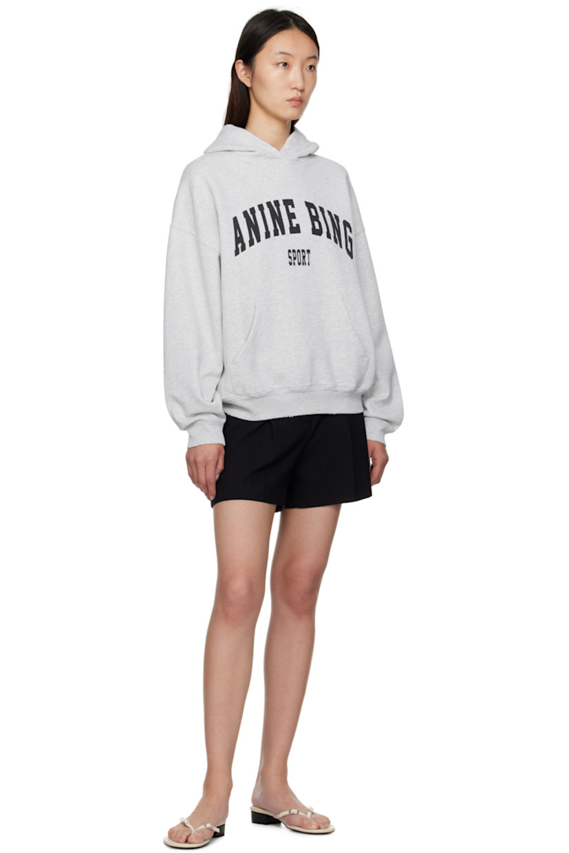 Relaxed-fit cotton fleece hoodie.

· Logo printed at front
· Kangaroo pocket
· Rib-knit hem and cuffs
· Distressing at hem

Supplier color: Heather Grey