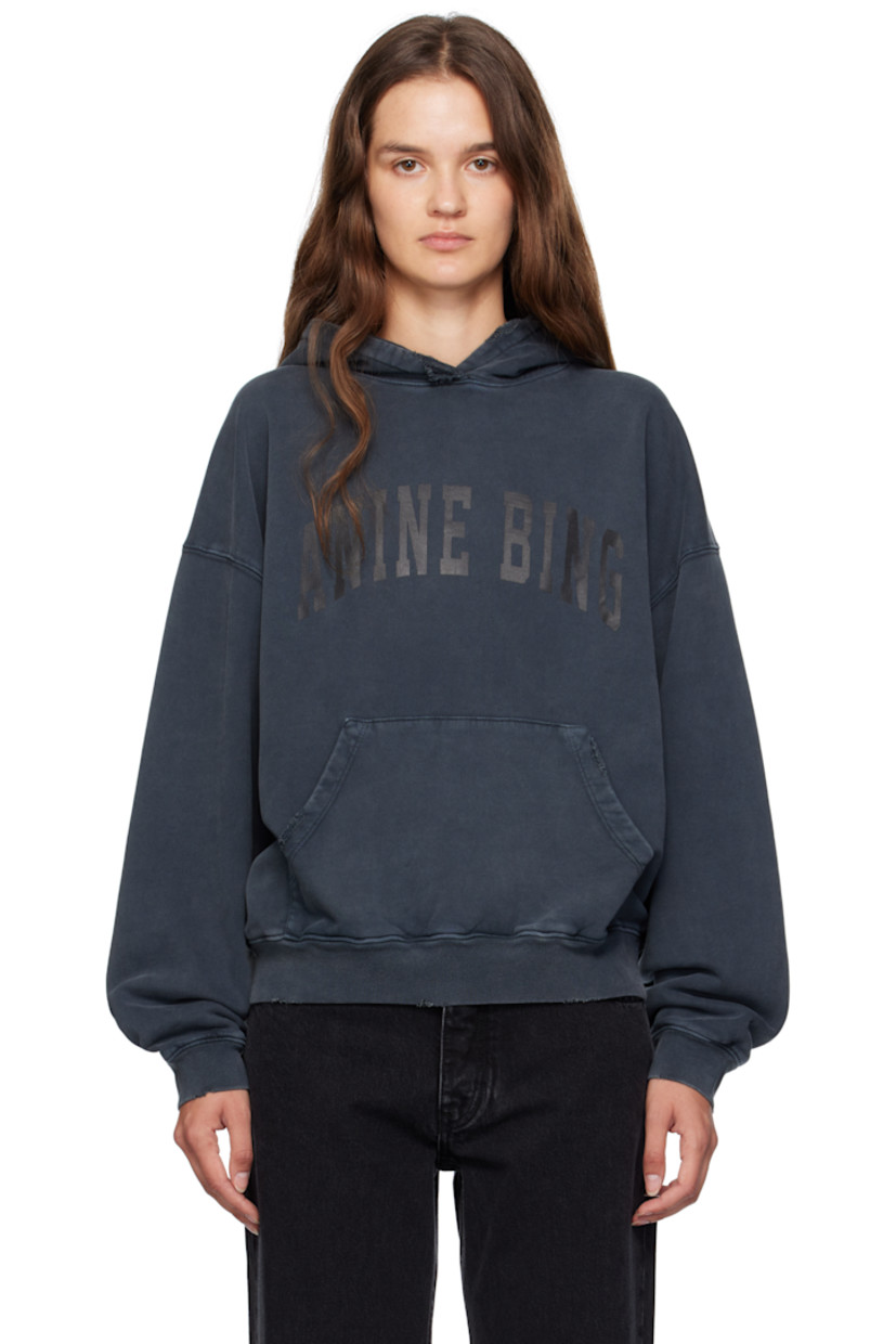 Cotton fleece hoodie.

· Fading and distressing throughout
· Logo printed at chest
· Kangaroo pocket at waist
· Rib-knit hem and cuffs
· Dropped shoulders

Supplier color: Washed black