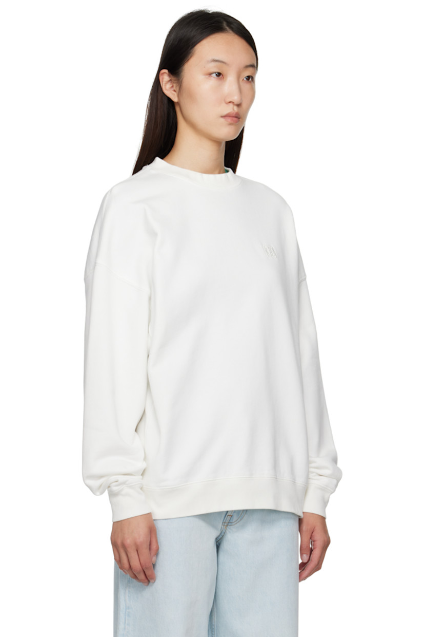 Relaxed-fit cotton fleece sweatshirt.

· Rib-knit crewneck, hem, and cuffs
· Logo embroidered at chest
· Dropped shoulders
· Logo bonded at back collar

Supplier color: Off White