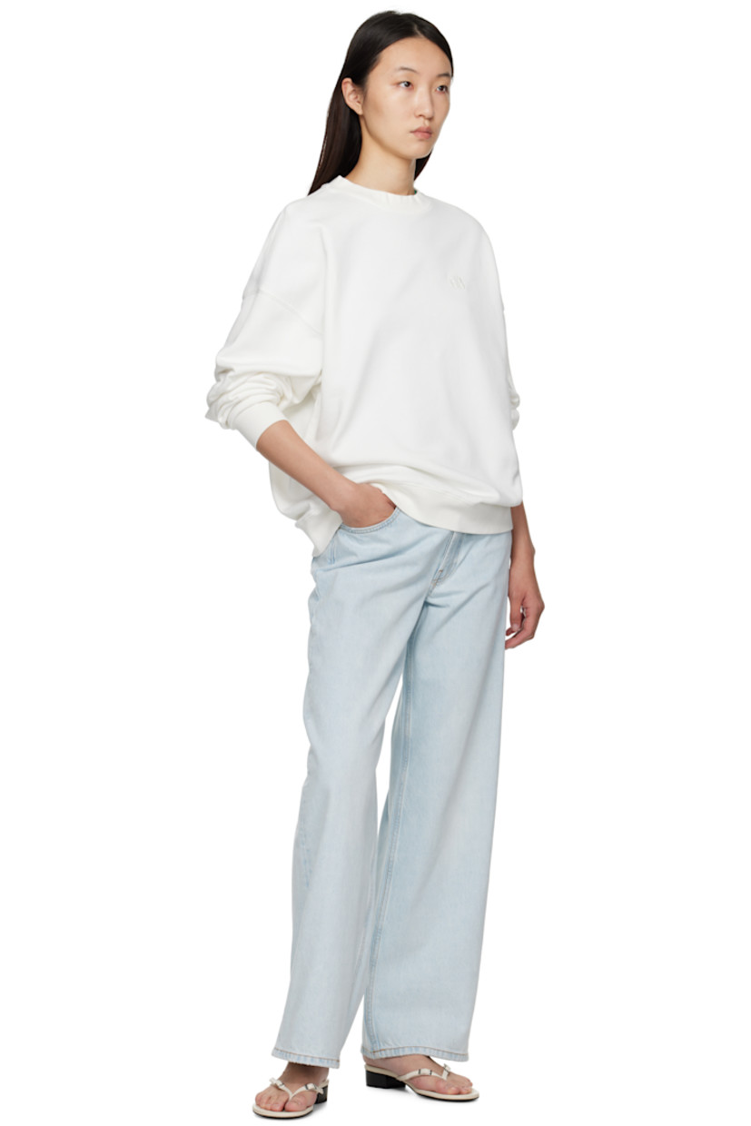 Relaxed-fit cotton fleece sweatshirt.

· Rib-knit crewneck, hem, and cuffs
· Logo embroidered at chest
· Dropped shoulders
· Logo bonded at back collar

Supplier color: Off White
