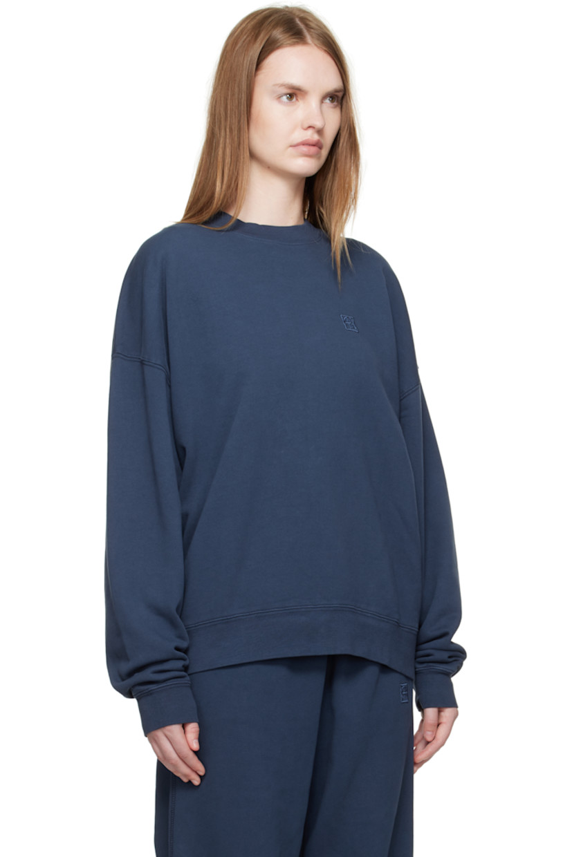 French terry sweatshirt. 

· Rib-knit crewneck, hem, and cuffs
· Logo embroidered at chest
· Dropped shoulders
· Bonded logo at back collar 

Supplier color: Washed navy