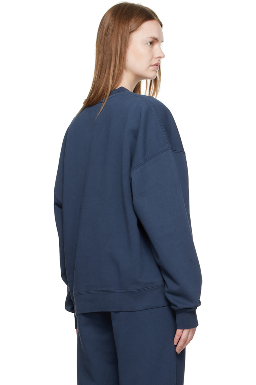 French terry sweatshirt. 

· Rib-knit crewneck, hem, and cuffs
· Logo embroidered at chest
· Dropped shoulders
· Bonded logo at back collar 

Supplier color: Washed navy