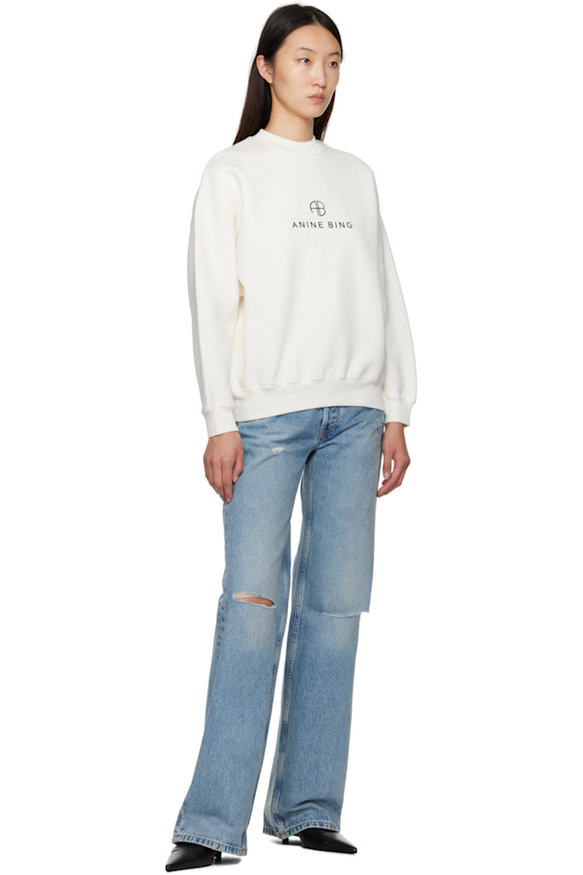 Loose-fit cotton-blend fleece sweatshirt.

· Rib-knit crewneck, hem, and cuffs
· Logo printed at chest
· Dropped shoulders
· Logo bonded at back collar

Supplier color: Ivory