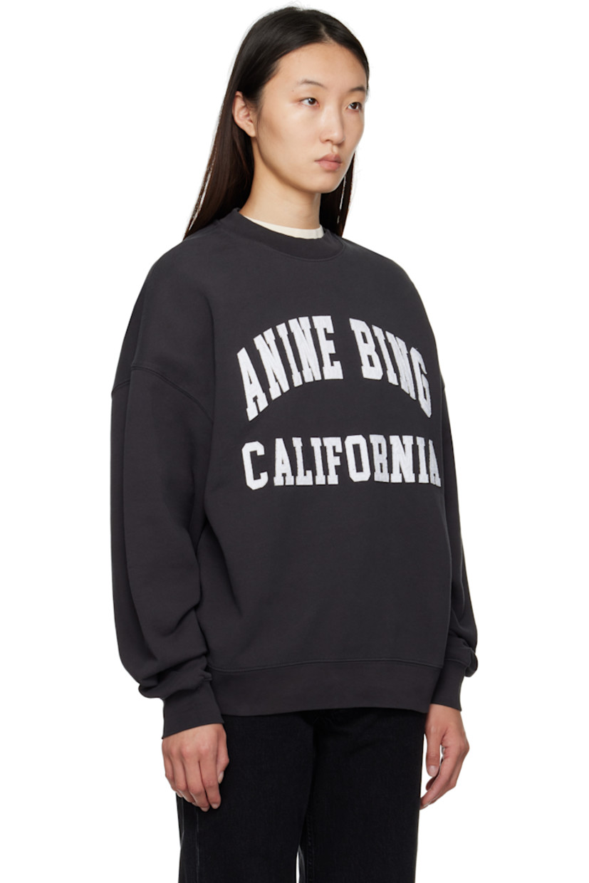Relaxed-fit organic cotton fleece sweatshirt.

· Rib-knit crewneck, hem, and cuffs
· Logo and text appliqués at front
· Dropped shoulders
· Logo bonded at back collar

Supplier color: Vintage Black