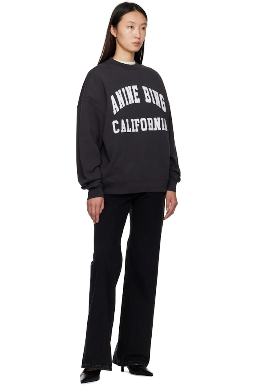 Relaxed-fit organic cotton fleece sweatshirt.

· Rib-knit crewneck, hem, and cuffs
· Logo and text appliqués at front
· Dropped shoulders
· Logo bonded at back collar

Supplier color: Vintage Black