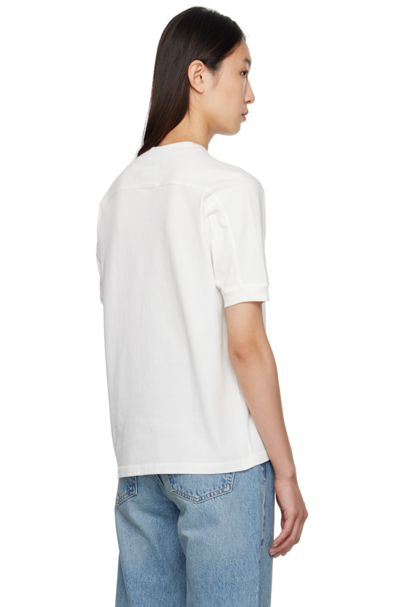 Heavyweight cotton jersey T-shirt.

· Rib-knit crewneck and cuffs
· Logo and text printed at front
· Saddle shoulders
· Logo bonded at back collar

Supplier color: Ivory