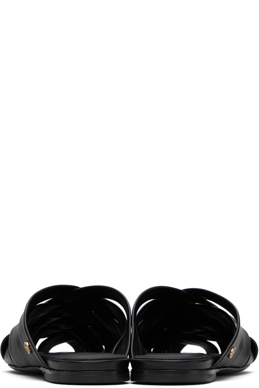 Woven buffed goatskin slippers.

· Pointed toe
· Logo hardware at outer side
· Logo printed at padded footbed
· Polished leather sole

Supplier color: Black