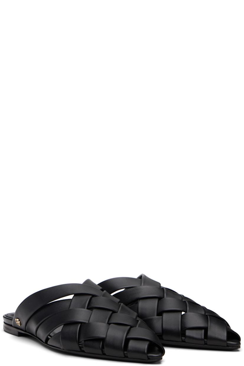 Woven buffed goatskin slippers.

· Pointed toe
· Logo hardware at outer side
· Logo printed at padded footbed
· Polished leather sole

Supplier color: Black