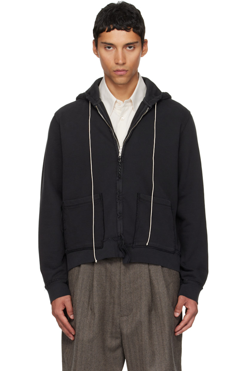 French terry hoodie. 

· Exposed seams and fading throughout 
· Drawstring at hood
· Zip closure
· Patch pockets at waist
· Rib-knit hem and cuffs

Supplier color: Black