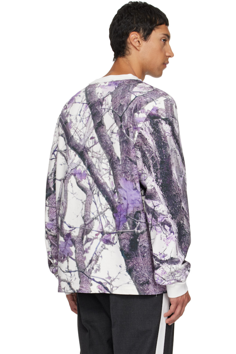 Heavyweight cotton jersey T-shirt. 

· Graphic pattern printed throughout 
· Exposed seams at rib-knit crewneck and cuffs
· Topstitching at back collar 

Supplier color: Purple/White real tree camo
