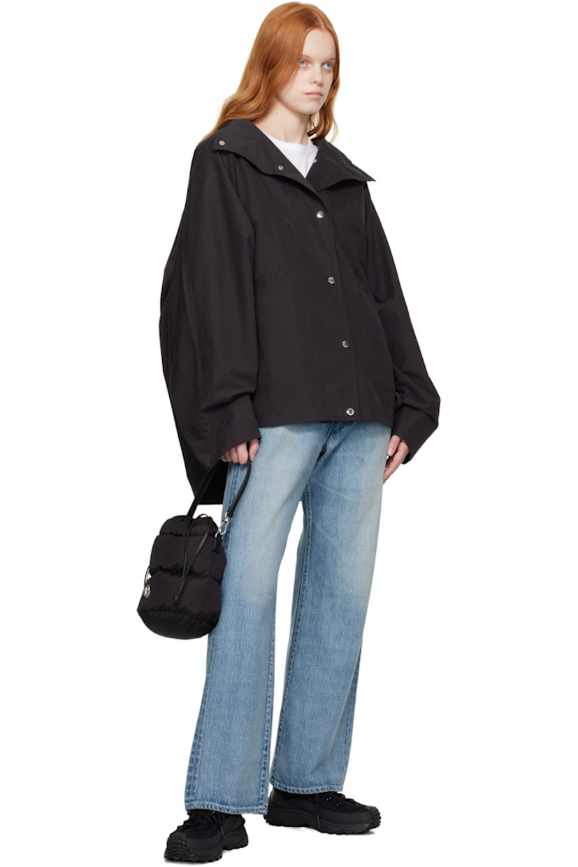 Down-filled and quilted nylon taffeta shoulder bag.

· Water-repellent
· DIST-certified down
· Detachable calfskin carry handle
· Detachable crossbody strap
· Logo hardware at face
· Drawstring closure
· Patch pocket at interior
· H9.5" x W9" x D6.5"

Supplier color: Black

Fill: 90% goose down, 10% goose feather.