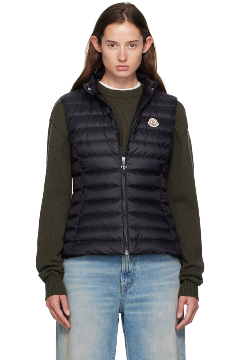 Down-filled quilted satin vest.

· DIST-certified down and feathers
· Press-stud tab at stand collar
· Two-way zip closure
· Embroidered logo patch at chest
· Zip pockets at waist

Supplier color: Black

Fill: 90% down, 10% feathers.