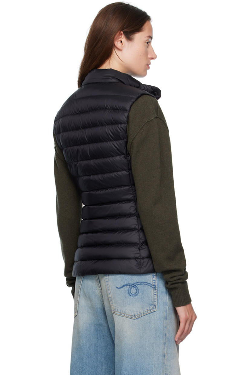 Down-filled quilted satin vest.

· DIST-certified down and feathers
· Press-stud tab at stand collar
· Two-way zip closure
· Embroidered logo patch at chest
· Zip pockets at waist

Supplier color: Black

Fill: 90% down, 10% feathers.