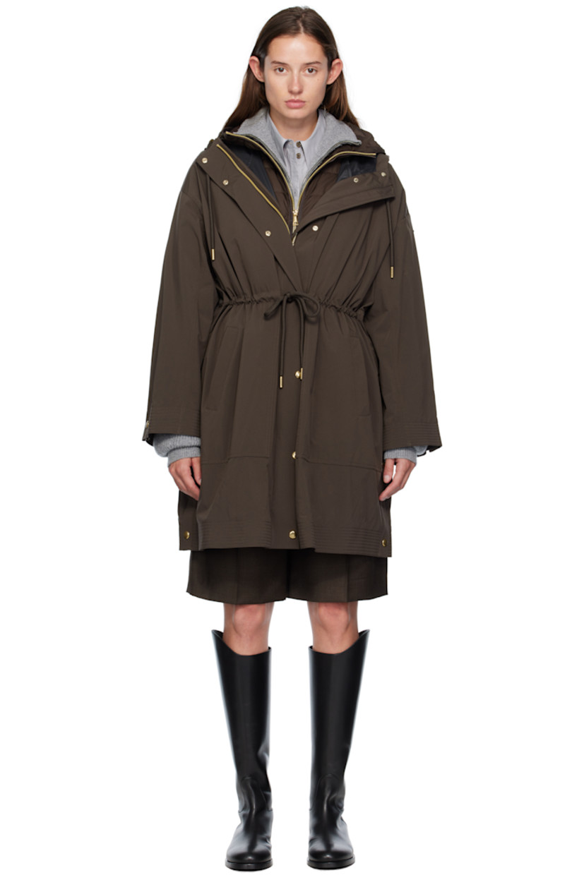 Plain-woven nylon and satin trench coat.

· Drawstring at hood
· Concealed two-way zip closure
· Press-stud placket 
· Self-tie drawstring and welt pockets at waist
· Press-stud vent at side seams
· Dropped shoulders
· Logo patch at sleeve
· Adjustable press-stud cuffs
· Detachable down-filled quilted vest-style underlay 

Supplier color: Brown

Fill: 90% goose down, 10% goose feather.