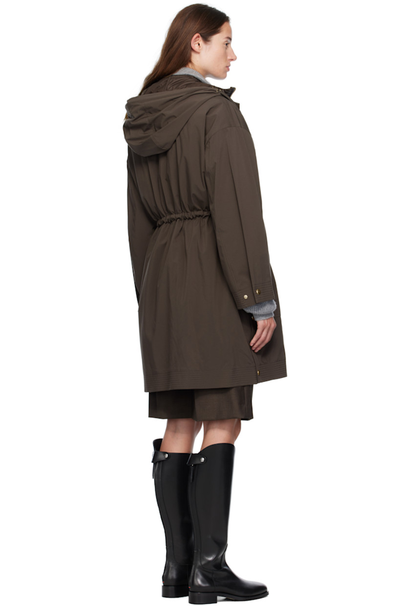 Plain-woven nylon and satin trench coat.

· Drawstring at hood
· Concealed two-way zip closure
· Press-stud placket 
· Self-tie drawstring and welt pockets at waist
· Press-stud vent at side seams
· Dropped shoulders
· Logo patch at sleeve
· Adjustable press-stud cuffs
· Detachable down-filled quilted vest-style underlay 

Supplier color: Brown

Fill: 90% goose down, 10% goose feather.