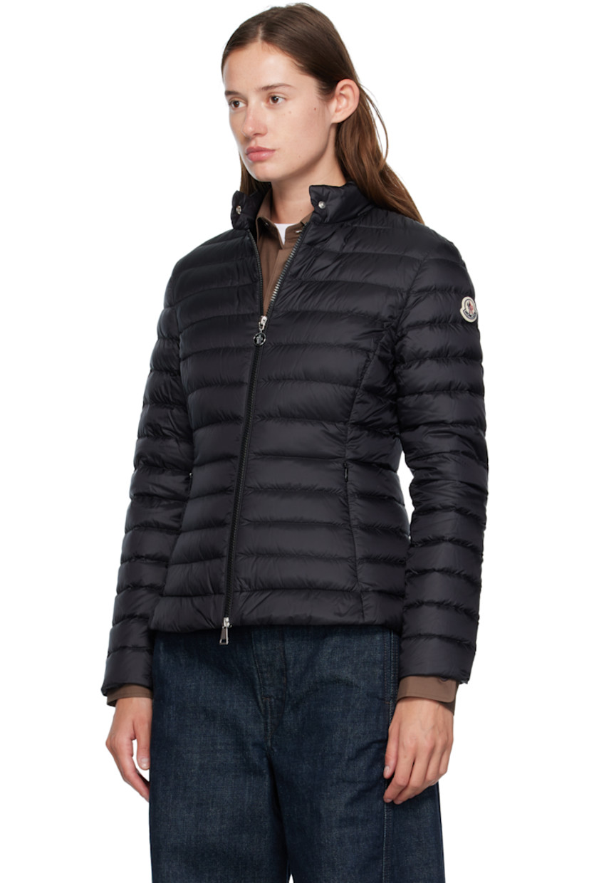 Down-filled and quilted recycled nylon taffeta jacket.

· DIST-certified down
· Press-stud fastening at stand collar
· Two-way zip closure
· Zip seam pockets at waist
· Tricolor felted logo patch at sleeve
· Patch pockets at interior
· Fully lined
· Logo-engraved silver-tone hardware

Supplier color: Black

Fill 1: 90% goose down, 10% feather. Fill 2: 100% polyester.