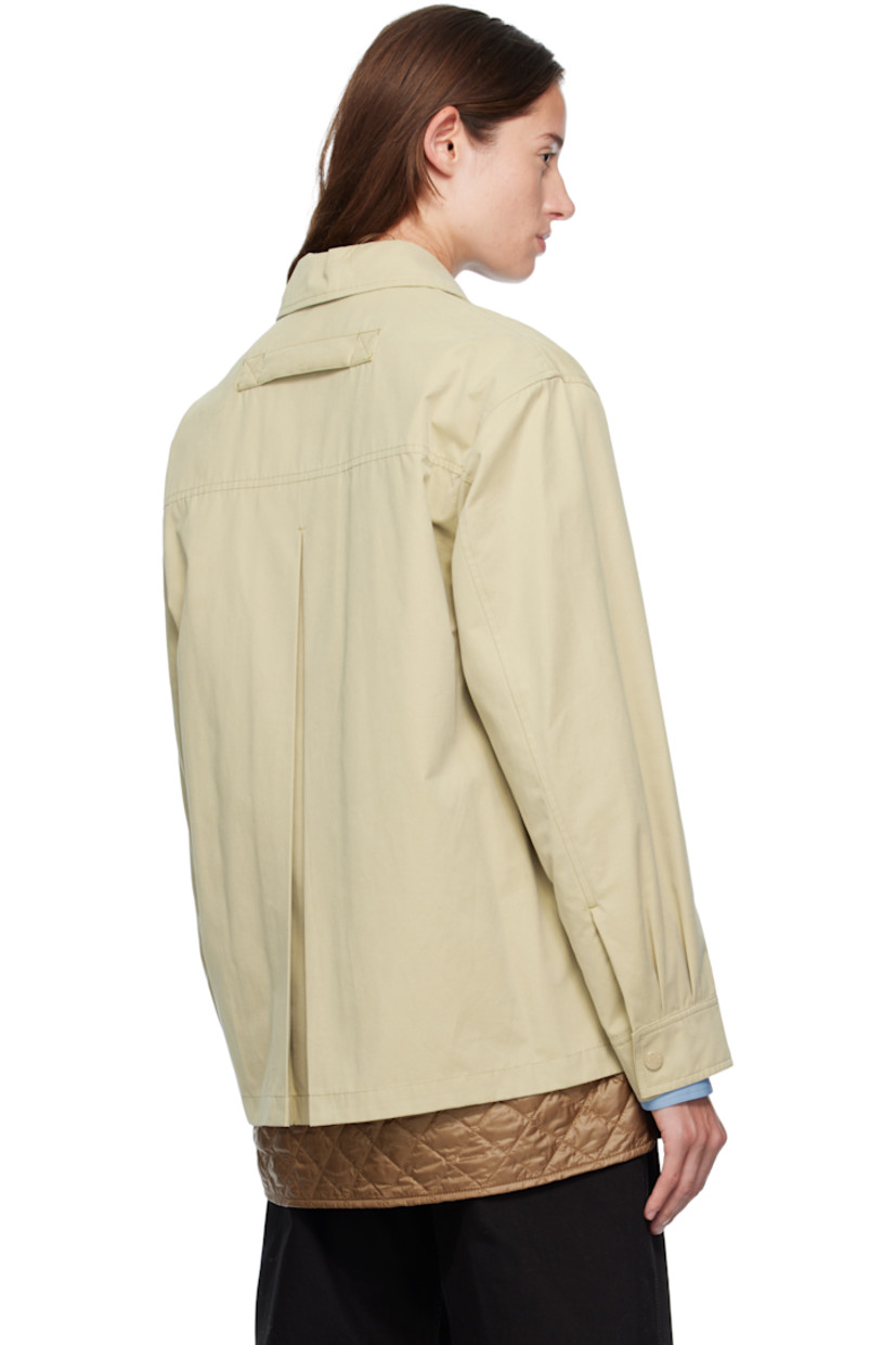 Cotton-blend canvas jacket. 

· Spread collar 
· Two-way zip closure
· Flap pockets at waist
· Zip vent at side seams 
· Utility pocket and tricolor felted logo patch at sleeve
· Pleats at press-stud barrel cuffs
· Strap at back collar 
· Inverted box pleat at back yoke 
· Exposed quilted satin lining 

Supplier color: Sponge