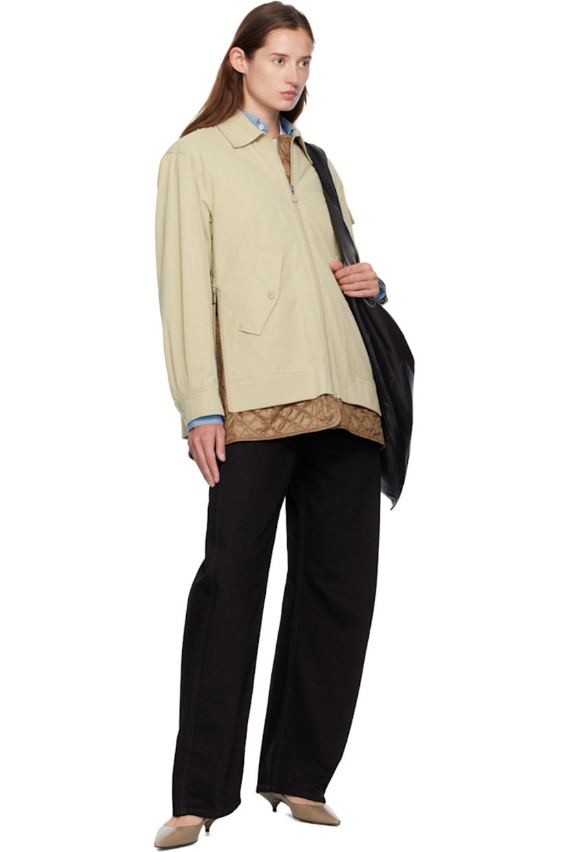 Cotton-blend canvas jacket. 

· Spread collar 
· Two-way zip closure
· Flap pockets at waist
· Zip vent at side seams 
· Utility pocket and tricolor felted logo patch at sleeve
· Pleats at press-stud barrel cuffs
· Strap at back collar 
· Inverted box pleat at back yoke 
· Exposed quilted satin lining 

Supplier color: Sponge