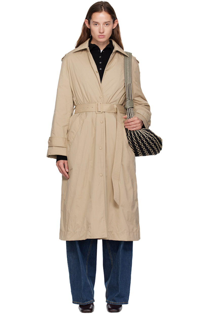 Down-filled nylon taffeta trench coat.

· Spread collar 
· Press-stud closure
· Welt pockets at front
· Belt loops  
· Detachable pin-buckle belt at waist
· Epaulets
· Logo patch at sleeve
· Adjustable press-stud tab at cuffs
· Storm flap at back yoke 
· Full quilted satin lining 

Supplier color: Woodsmoke 

Fill: 90% goose down, 10% goose feather.