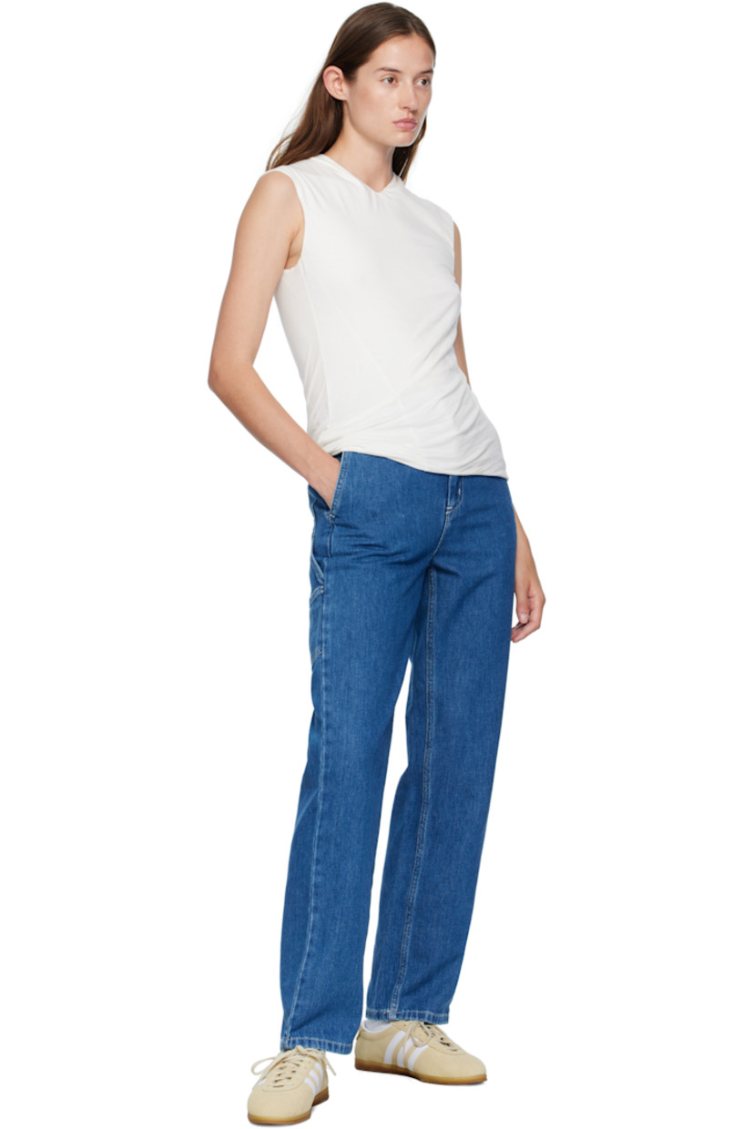 Stonewashed 10.5 oz non-stretch Maverick denim jeans. 

· Straight-leg 
· Belt loops
· Four-pocket styling
· Zip fly 
· Cargo pockets at outseams 
· Hammer loop at outseam
· Logo patch at back pocket
· Contrast stitching in white 

Supplier color: Blue stonewashed