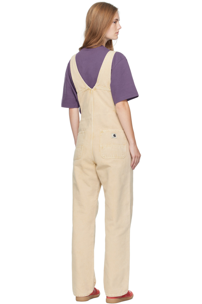 Heavyweight 12 oz organic cotton canvas overalls.

· Fading throughout
· Square neck
· Patch pockets at chest
· Logo patch at chest and back pocket
· Four-pocket styling
· Mock fly
· Button fastening at sides
· Adjustable shoulder straps

Supplier color: Dusty Hamilton brown (chalk wash)