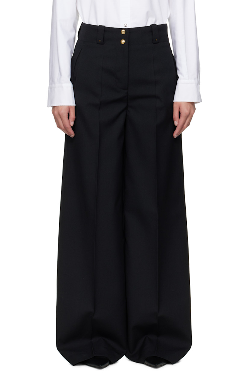 Polyester- and virgin wool-blend cavalry twill trousers.

· Belt loops
· Logo hardware at front belt loops
· Four-pocket styling
· Zip fly
· Creased legs
· Embroidered logo patch at back
· Logo-engraved gold-tone hardware

Supplier color: Black
