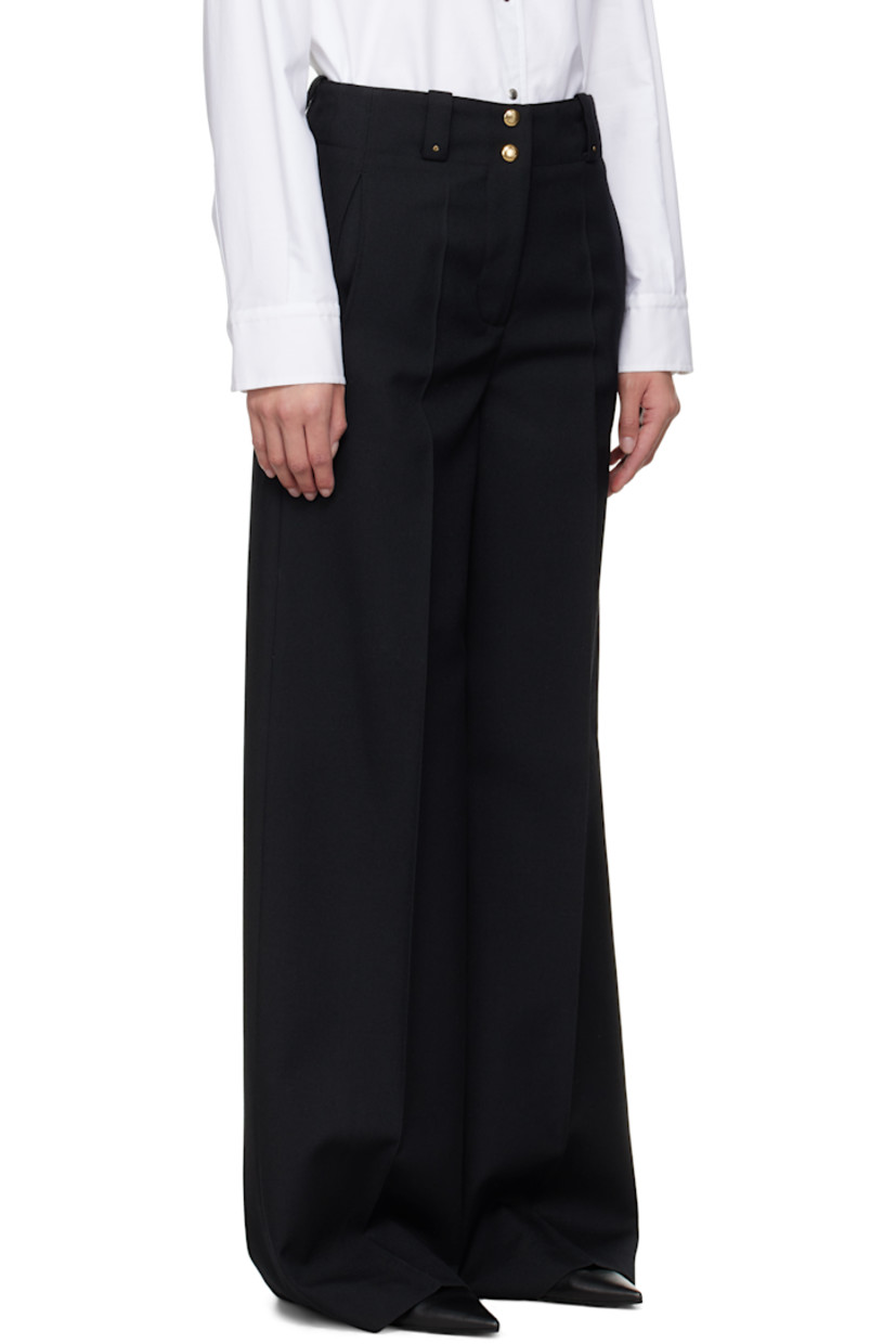 Polyester- and virgin wool-blend cavalry twill trousers.

· Belt loops
· Logo hardware at front belt loops
· Four-pocket styling
· Zip fly
· Creased legs
· Embroidered logo patch at back
· Logo-engraved gold-tone hardware

Supplier color: Black
