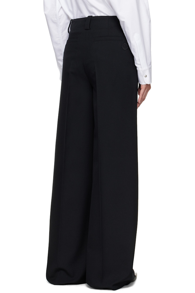 Polyester- and virgin wool-blend cavalry twill trousers.

· Belt loops
· Logo hardware at front belt loops
· Four-pocket styling
· Zip fly
· Creased legs
· Embroidered logo patch at back
· Logo-engraved gold-tone hardware

Supplier color: Black