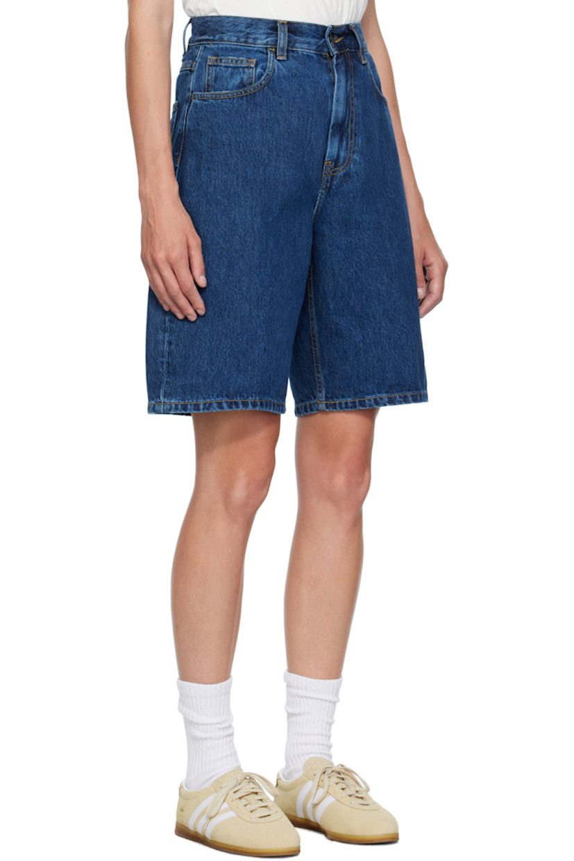 Stonewashed 13.5 oz non-stretch Smith denim shorts.

· Fading and subtle distressing throughout 
· Low-rise
· Belt loops
· Five-pocket styling
· Zip fly
· Logo patch at back pocket
· Contrast stitching in tan

Supplier color: Blue stonewashed