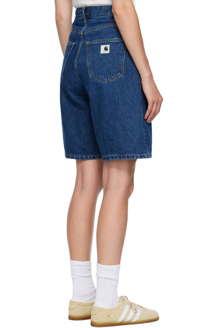 Stonewashed 13.5 oz non-stretch Smith denim shorts.

· Fading and subtle distressing throughout 
· Low-rise
· Belt loops
· Five-pocket styling
· Zip fly
· Logo patch at back pocket
· Contrast stitching in tan

Supplier color: Blue stonewashed