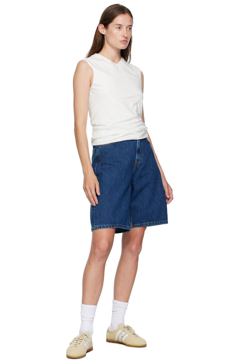 Stonewashed 13.5 oz non-stretch Smith denim shorts.

· Fading and subtle distressing throughout 
· Low-rise
· Belt loops
· Five-pocket styling
· Zip fly
· Logo patch at back pocket
· Contrast stitching in tan

Supplier color: Blue stonewashed