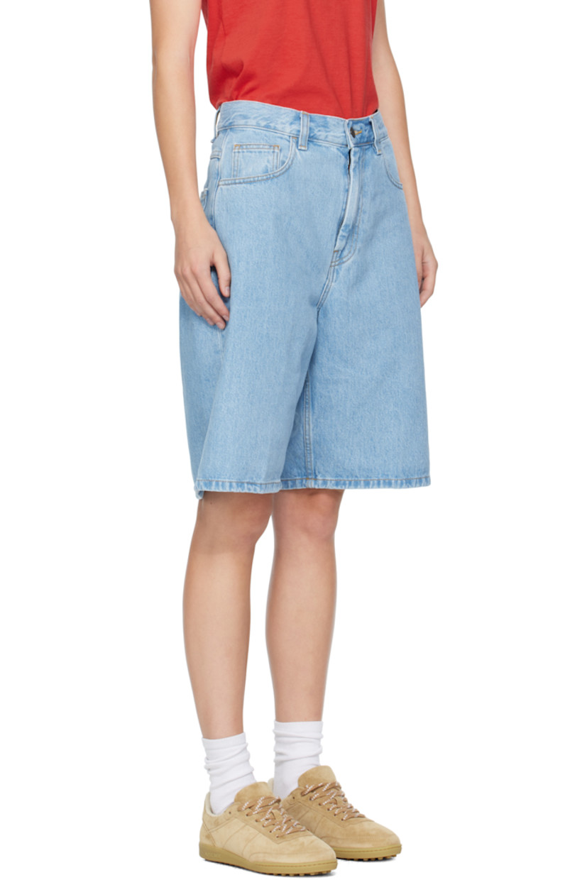 13.5 oz non-stretch denim shorts.

· Fading throughout
· Mid-rise
· Belt loops
· Five-pocket styling
· Zip fly
· Logo patch at back pocket
· Contrast stitching in tan

Supplier color: Blue (stone bleached)