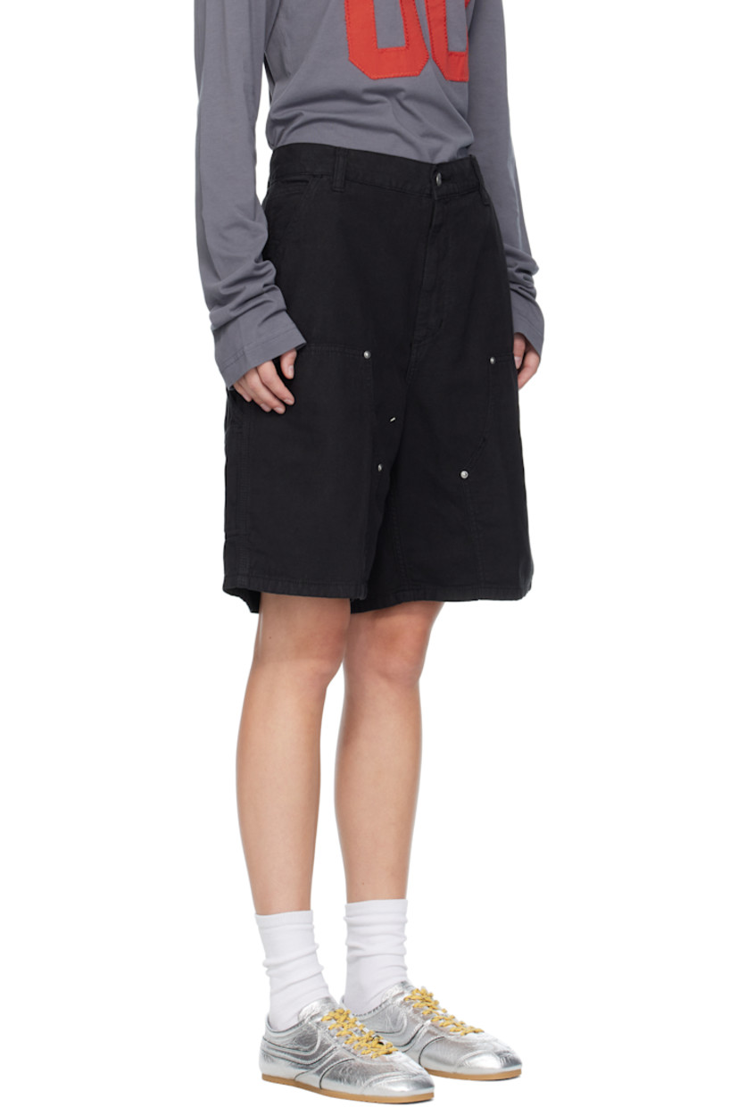 7.4 oz cotton- and linen-blend canvas shorts.

· Garment-dyed
· Mid-rise
· Belt loops
· Five-pocket styling
· Zip fly
· Patch pockets at outseam
· Hammer loop at outseam
· Logo patch at back pocket
· Contrast stitching in tan

Supplier color: Black (garment dyed)