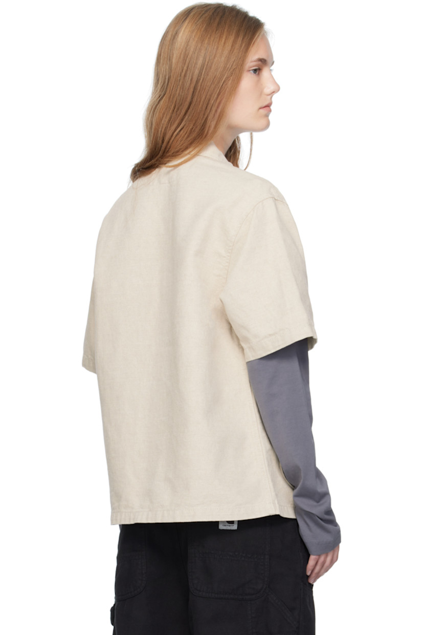 Cotton- and linen-blend canvas shirt.

· Spread collar
· Button closure
· Flap pocket and logo patch at chest
· Patch pockets at front

Supplier color: Natural