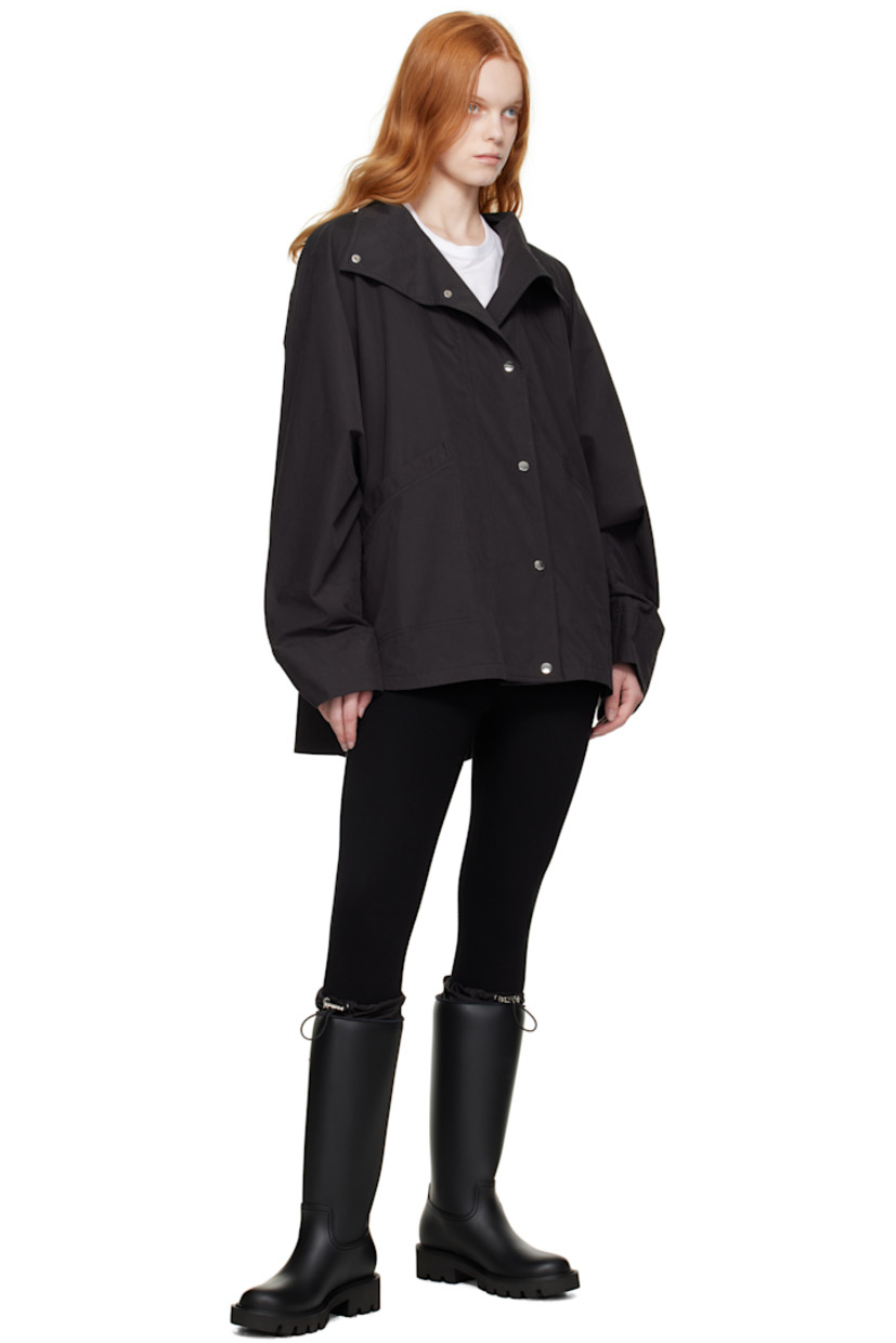 Knee-high rubber boots.

· Bungee-style drawstring at taffeta collar
· Rubberized logo patch at outer side
· Logo-printed pull-loop at heel tab
· Jersey lining
· Foam rubber midsole
· Treaded rubber sole
· Heel: H1.75"

Supplier color: Black