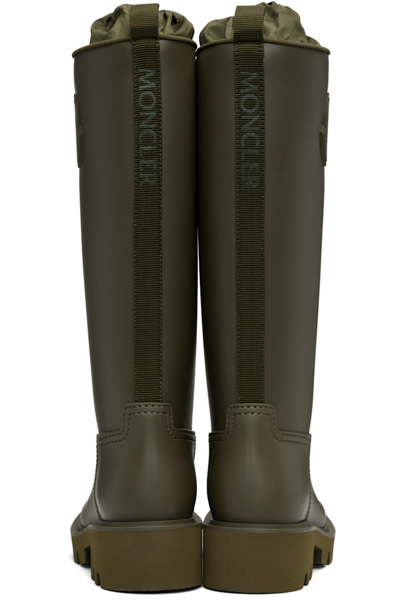 Knee-high rubber boots.

· Bungee-style drawstring at taffeta collar
· Rubberized logo patch at outer side
· Logo-printed pull-loop at heel tab
· Jersey lining
· Foam rubber midsole
· Treaded rubber sole
· Heel: H1.75"

Supplier color: Olive