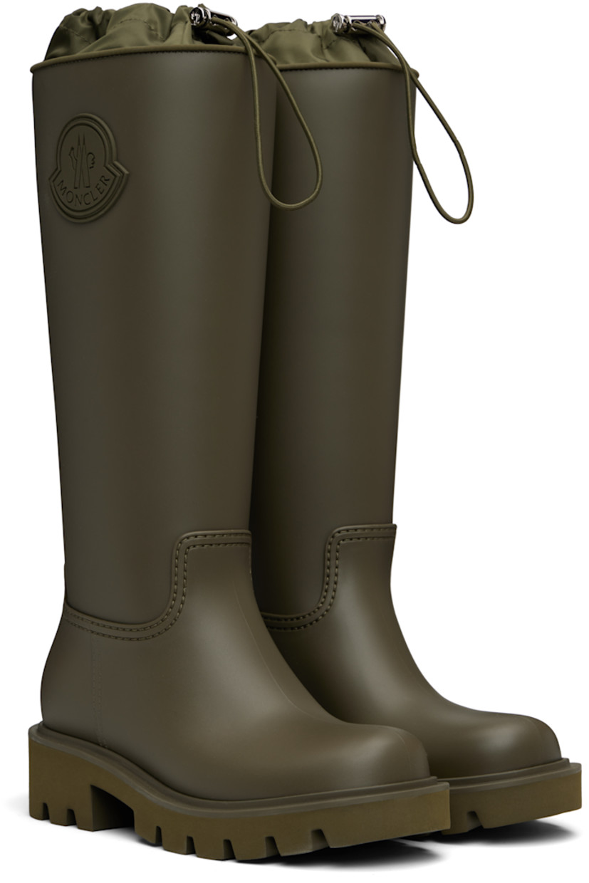 Knee-high rubber boots.

· Bungee-style drawstring at taffeta collar
· Rubberized logo patch at outer side
· Logo-printed pull-loop at heel tab
· Jersey lining
· Foam rubber midsole
· Treaded rubber sole
· Heel: H1.75"

Supplier color: Olive