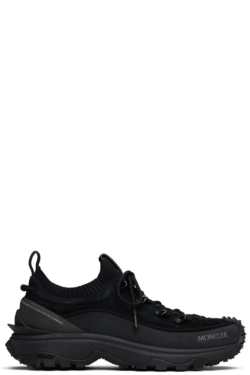 Low-top suede and nubuck sneakers in black.

· Logo printed at toe
· Lace-up closure
· Logo-printed pull-loop at tongue
· Rib-knit trim at padded collar
· Pull-loops at heel tab
· Textured logo-embossed rubber trim at heel counter
· Mesh lining
· Foam rubber midsole
· Treaded Vibram® Megagrip rubber sole

Supplier color: Black