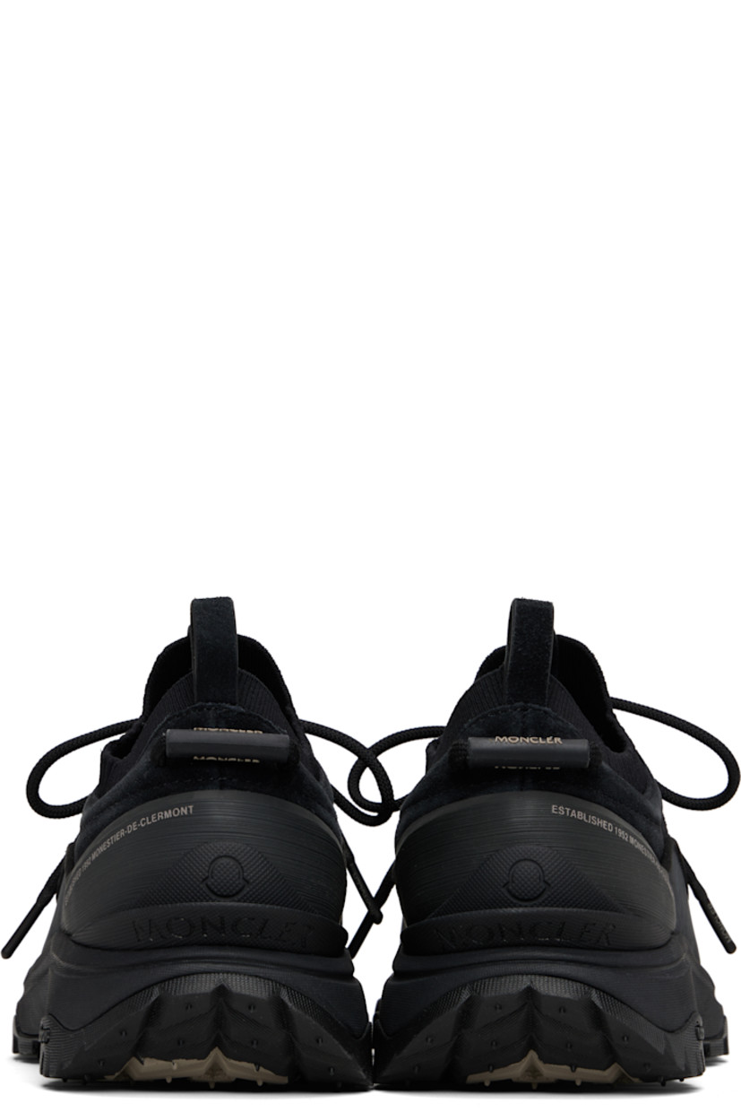 Low-top suede and nubuck sneakers in black.

· Logo printed at toe
· Lace-up closure
· Logo-printed pull-loop at tongue
· Rib-knit trim at padded collar
· Pull-loops at heel tab
· Textured logo-embossed rubber trim at heel counter
· Mesh lining
· Foam rubber midsole
· Treaded Vibram® Megagrip rubber sole

Supplier color: Black