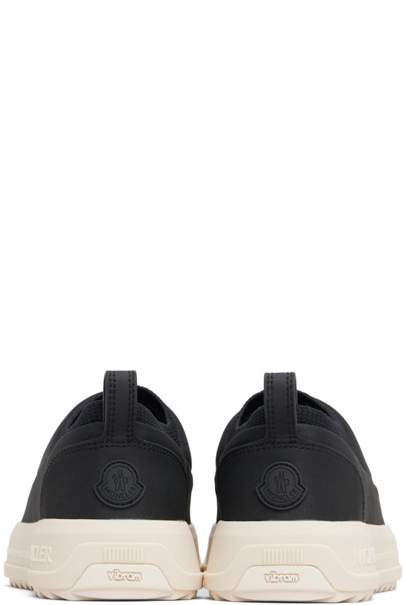 Low-top padded jersey and canvas slip-on sneakers.

· Rubberized logo patch at vamp and heel counter
· Rib-knit collar
· Pull-loop at heel collar
· Ortholite® insole
· Mesh lining
· Logo embossed at foam rubber midsole
· Treaded Vibram® Megagrip rubber sole

Supplier color: Black