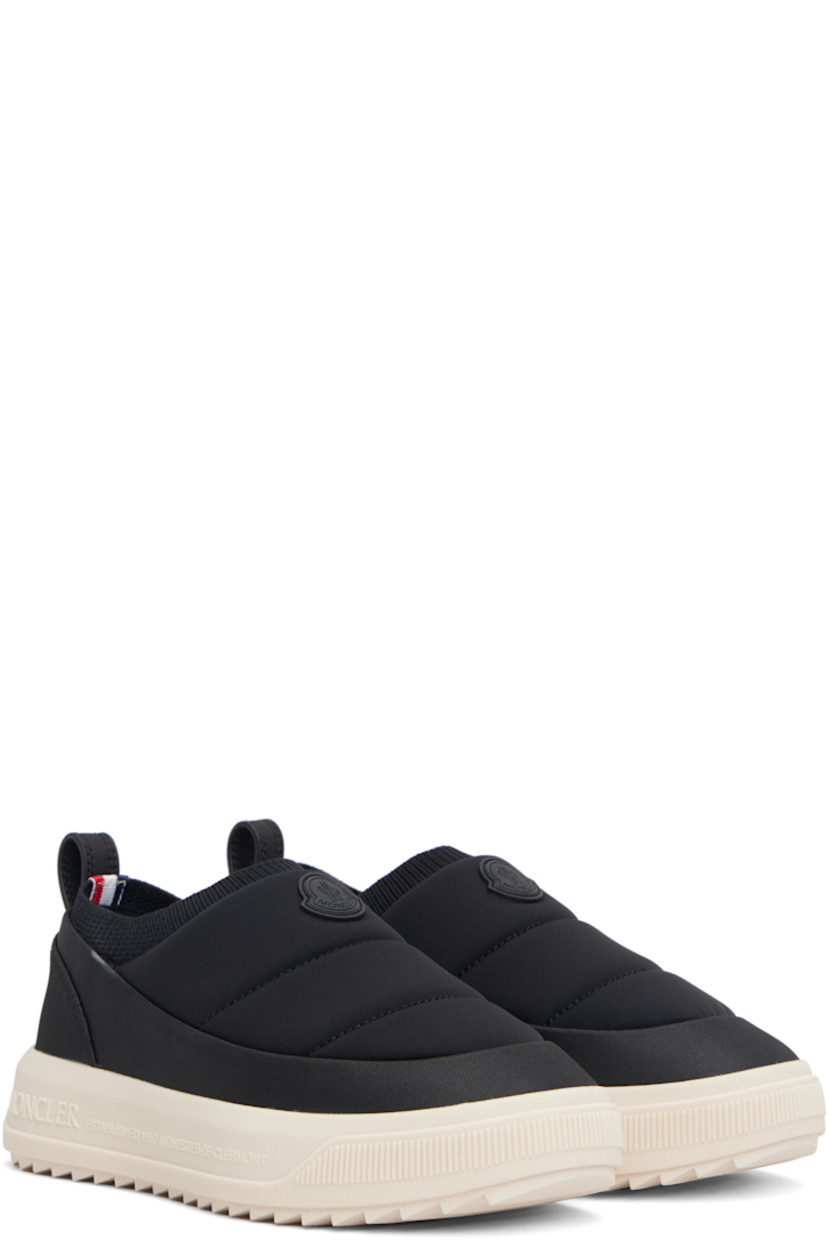 Low-top padded jersey and canvas slip-on sneakers.

· Rubberized logo patch at vamp and heel counter
· Rib-knit collar
· Pull-loop at heel collar
· Ortholite® insole
· Mesh lining
· Logo embossed at foam rubber midsole
· Treaded Vibram® Megagrip rubber sole

Supplier color: Black
