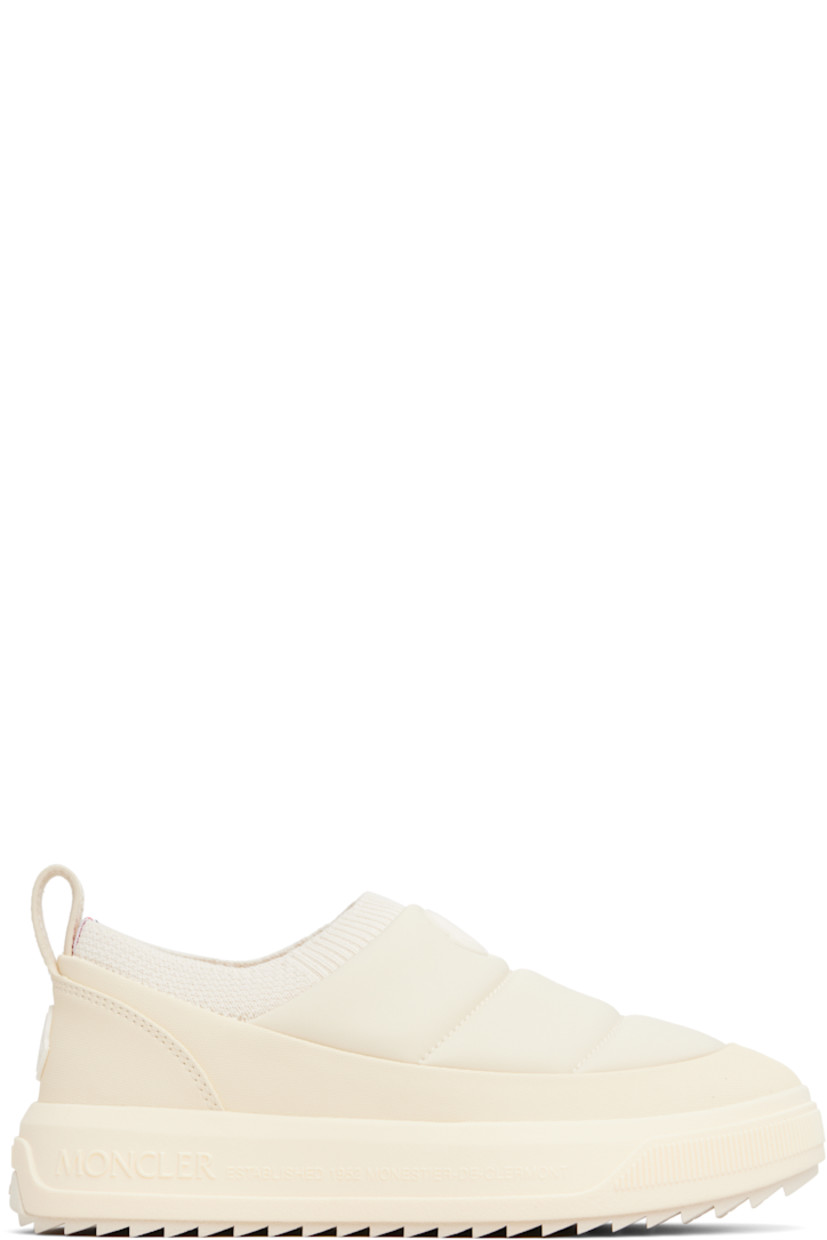 Low-top padded jersey and canvas slip-on sneakers.

· Rubberized logo patch at vamp and heel counter
· Rib-knit collar
· Pull-loop at heel collar
· Ortholite® insole
· Mesh lining
· Logo embossed at foam rubber midsole
· Treaded Vibram® Megagrip rubber sole

Supplier color: Light beige